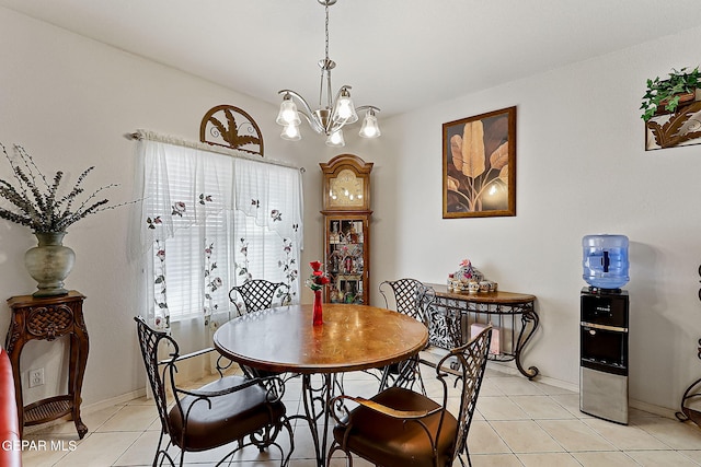 tiled dining area featuring a notable chandelier