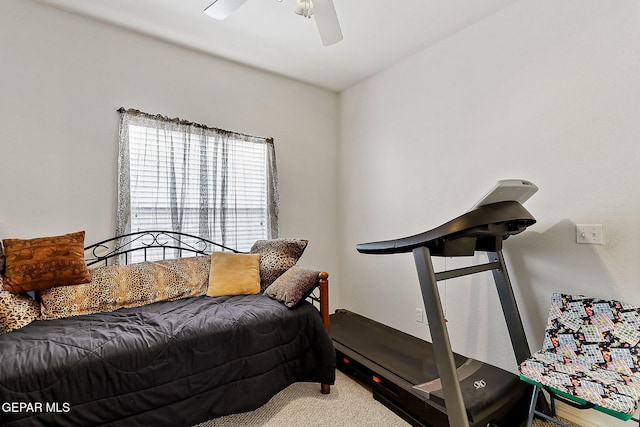 carpeted bedroom featuring ceiling fan