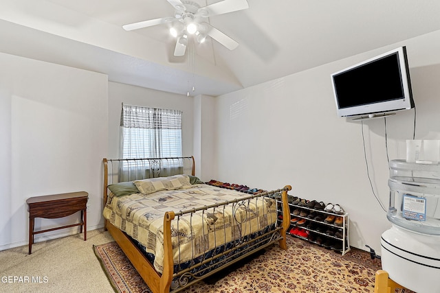 bedroom with lofted ceiling and ceiling fan