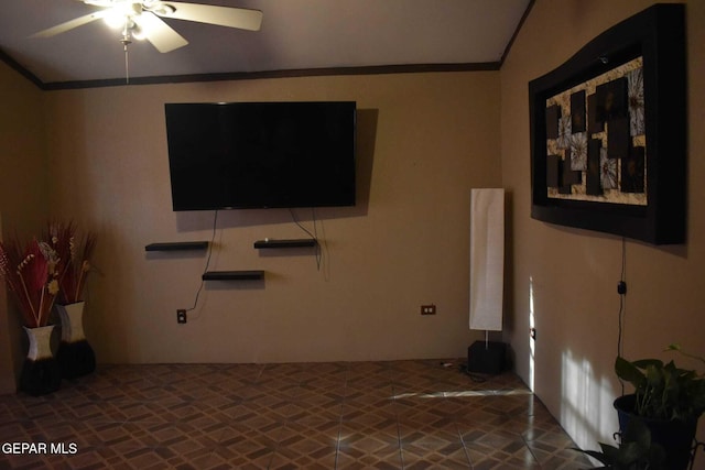 unfurnished living room featuring ornamental molding and ceiling fan