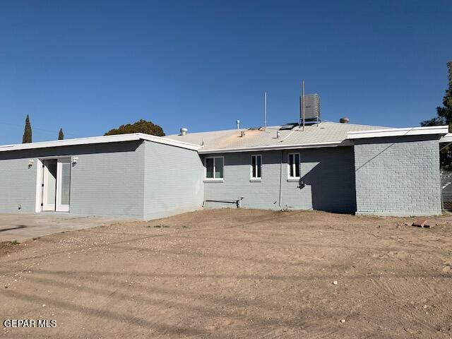 rear view of house featuring a patio