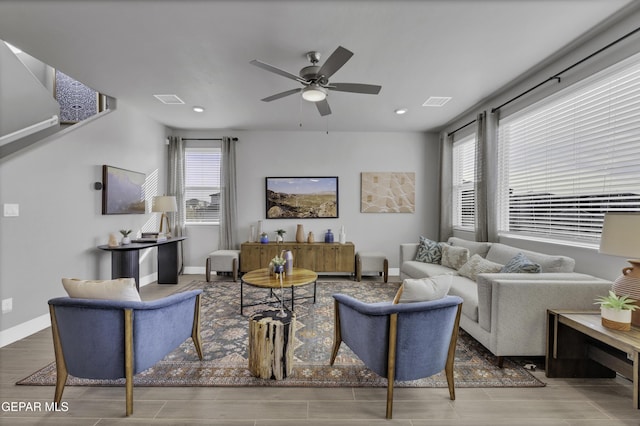 living room featuring ceiling fan