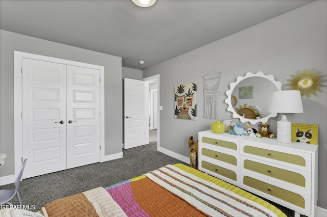 carpeted bedroom featuring a closet