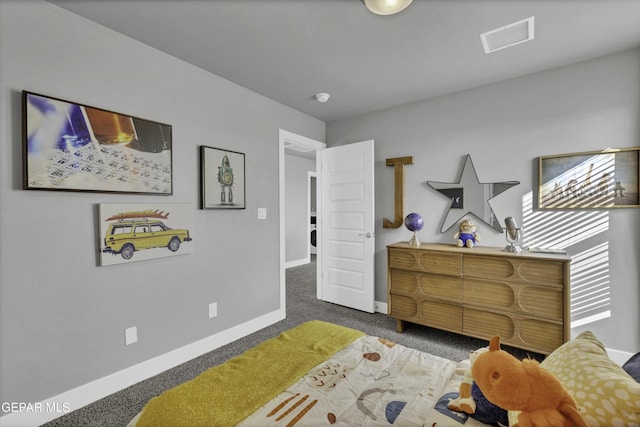 bedroom featuring dark colored carpet