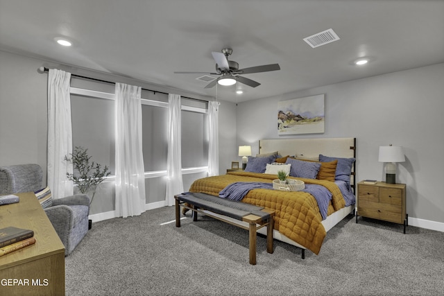 bedroom with ceiling fan and carpet floors