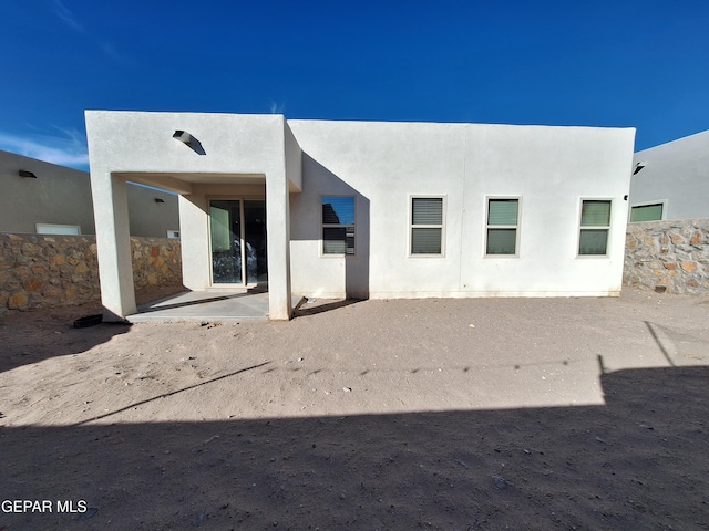 rear view of house with a patio area