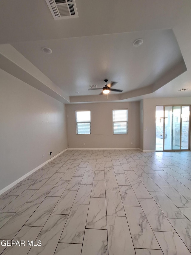 spare room with ceiling fan