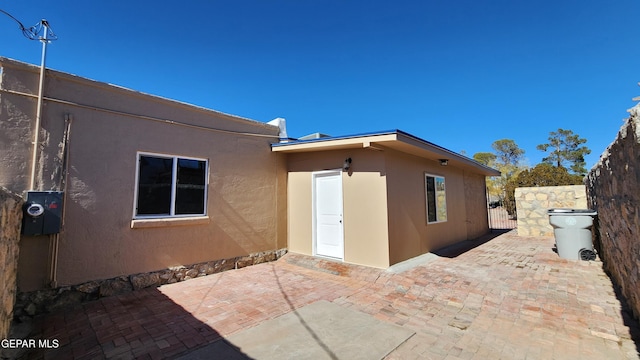 back of house with a patio area