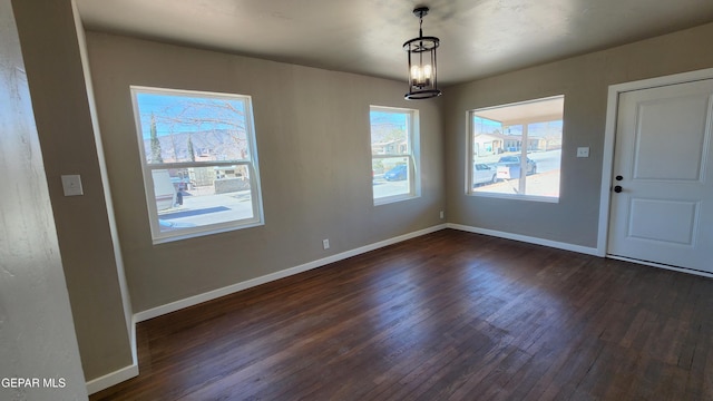 interior space with dark hardwood / wood-style flooring