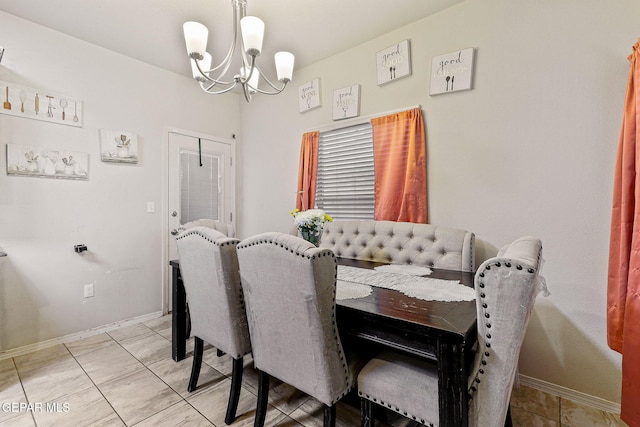 dining room featuring an inviting chandelier