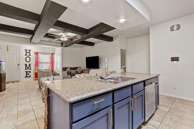 kitchen with blue cabinets, an island with sink, sink, stainless steel dishwasher, and ceiling fan