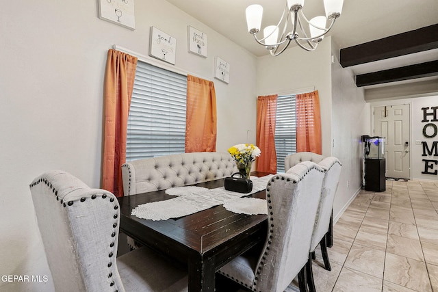 dining room with a notable chandelier