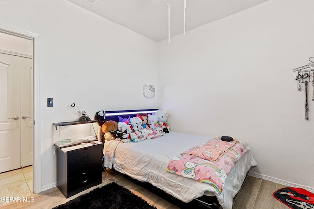 bedroom with light hardwood / wood-style flooring