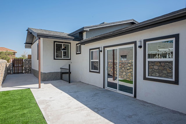 rear view of house featuring a patio