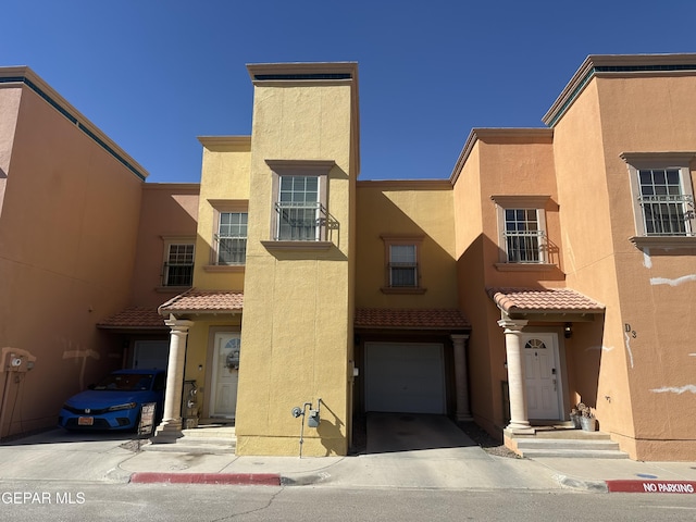 view of front of home with a garage