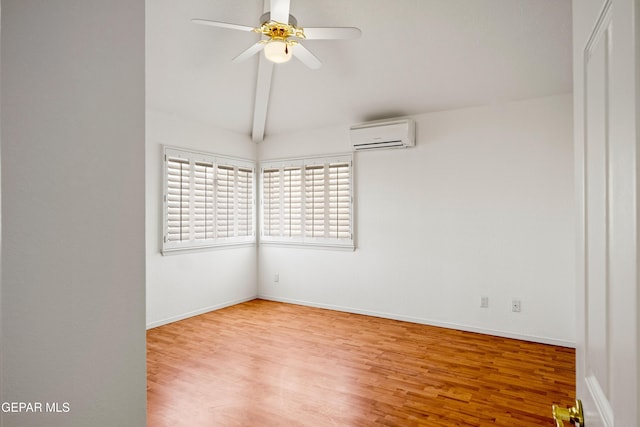 unfurnished room featuring ceiling fan, lofted ceiling with beams, a wall unit AC, and light hardwood / wood-style flooring