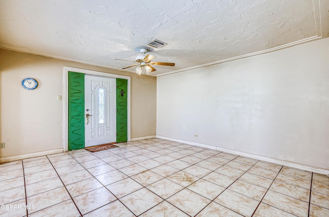 entrance foyer featuring ceiling fan and a textured ceiling