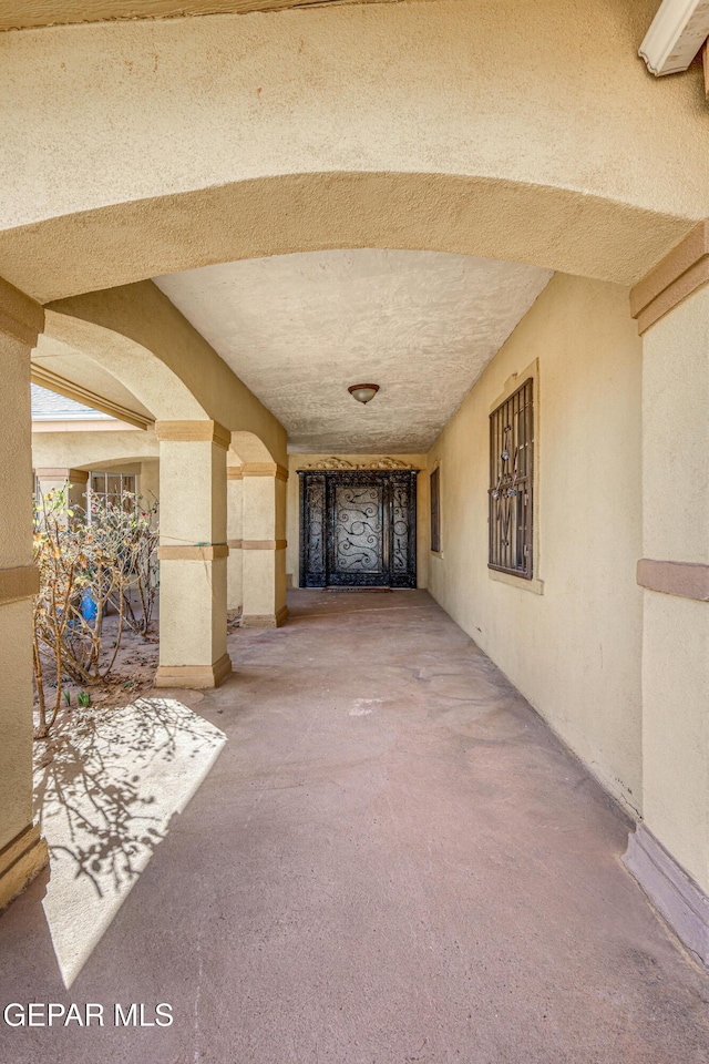 hall featuring carpet