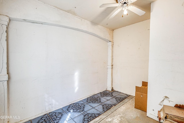 basement featuring ceiling fan