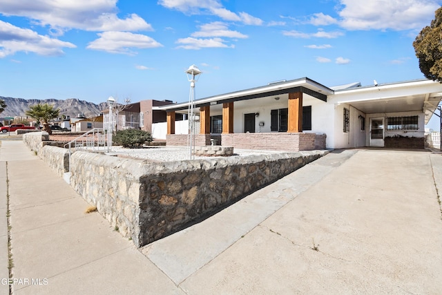 view of front facade with a mountain view