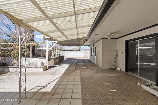 view of patio featuring ceiling fan