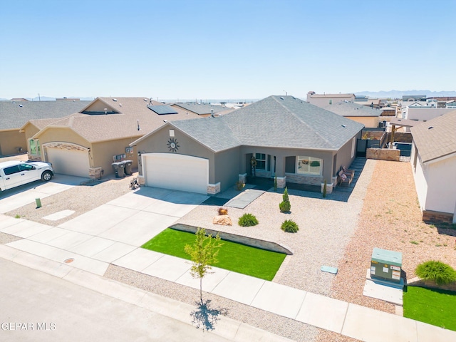 ranch-style home featuring a garage