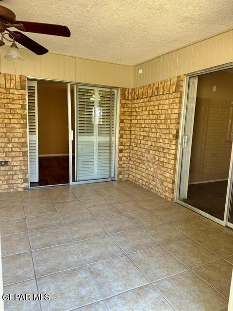 view of patio / terrace with ceiling fan