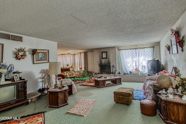 living room with carpet, a textured ceiling, and a fireplace