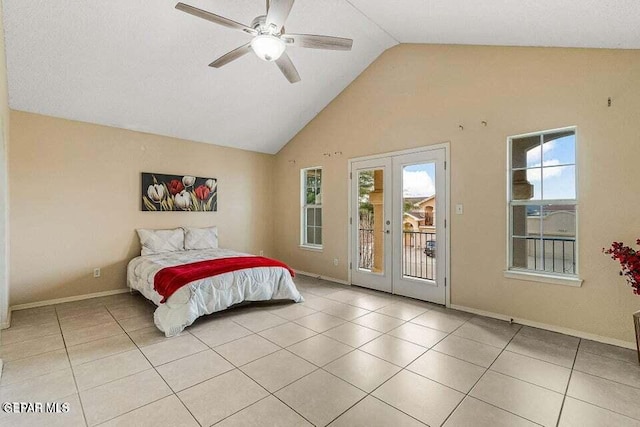 bedroom featuring lofted ceiling, ceiling fan, light tile patterned flooring, access to outside, and french doors