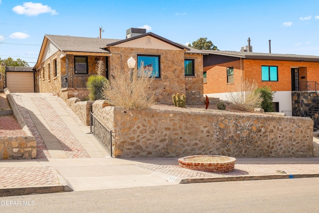 view of front of property featuring central air condition unit