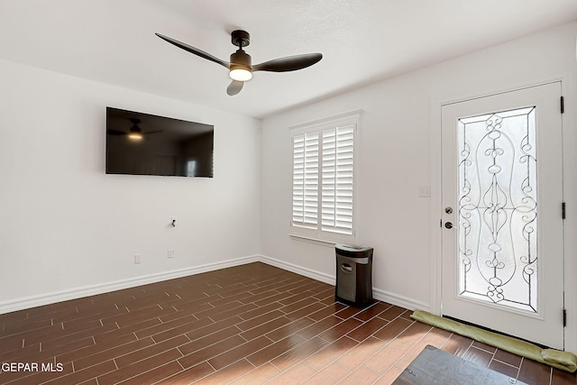 entrance foyer featuring ceiling fan