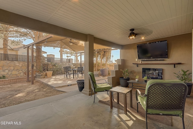 view of patio / terrace featuring ceiling fan