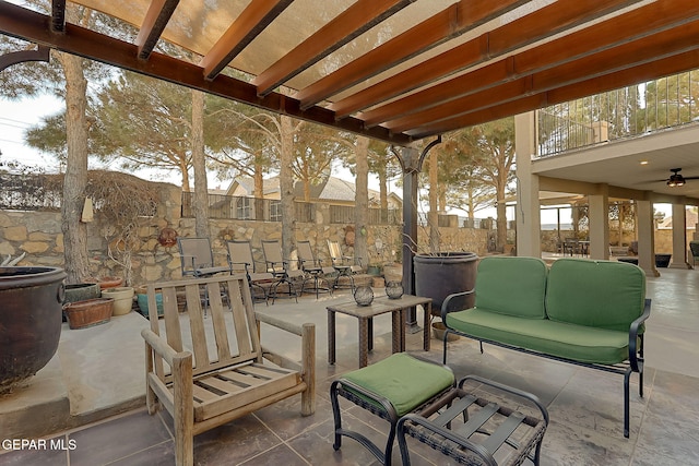 view of patio featuring outdoor lounge area and a balcony