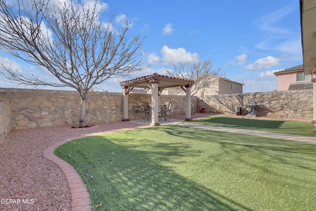 view of yard featuring a gazebo and a patio area