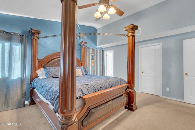 carpeted bedroom featuring ceiling fan and lofted ceiling