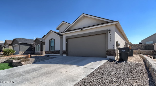 view of front of home featuring a garage and central AC unit