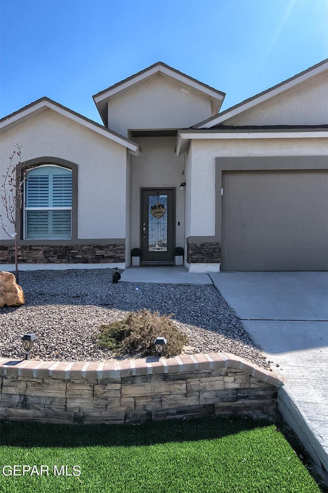 view of front of home with a garage