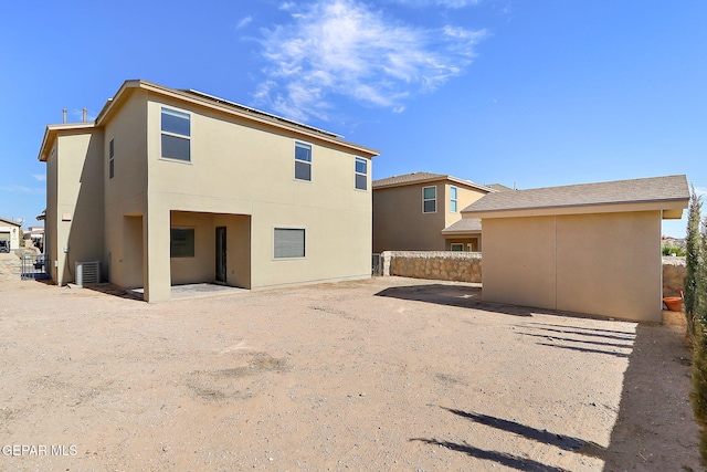 back of house featuring a patio