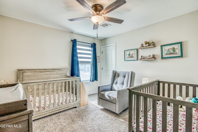 bedroom featuring ceiling fan, carpet flooring, and a closet