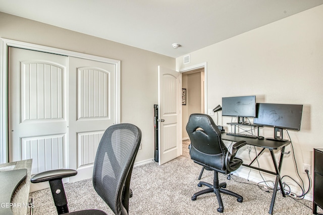 office area with light colored carpet