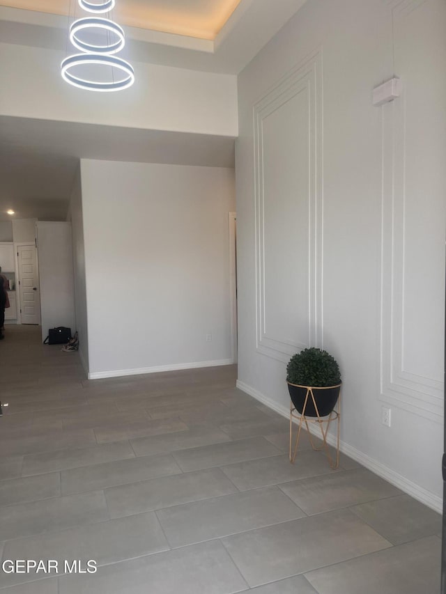 220 Emerald Brass, Horizon City, TX 79928 - spare room featuring baseboards