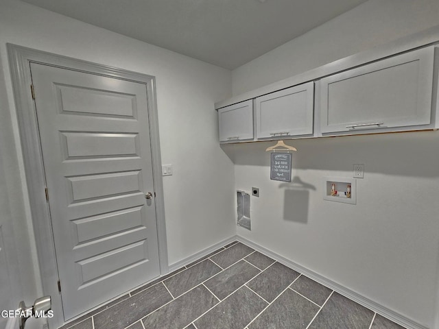 clothes washing area featuring electric dryer hookup, washer hookup, and cabinets