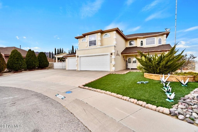 front facade with a garage and a front yard