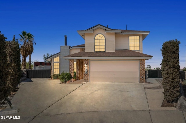 front of property with a garage