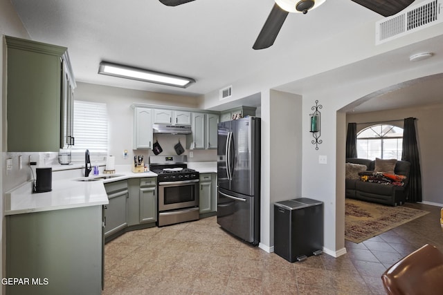 kitchen featuring sink, ceiling fan, and appliances with stainless steel finishes