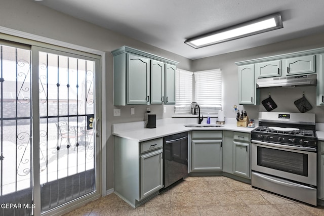 kitchen with appliances with stainless steel finishes and sink