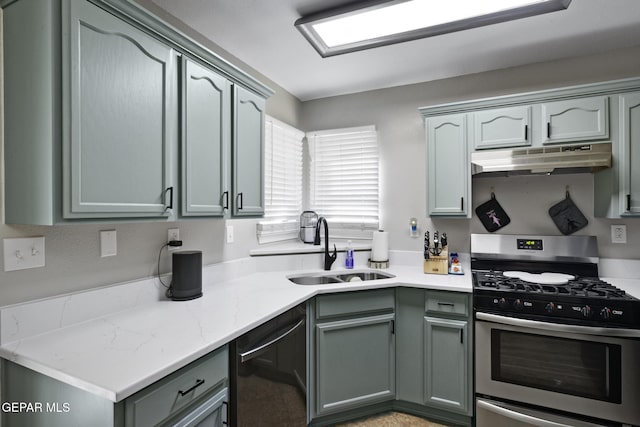 kitchen featuring stainless steel gas stove, sink, and dishwasher