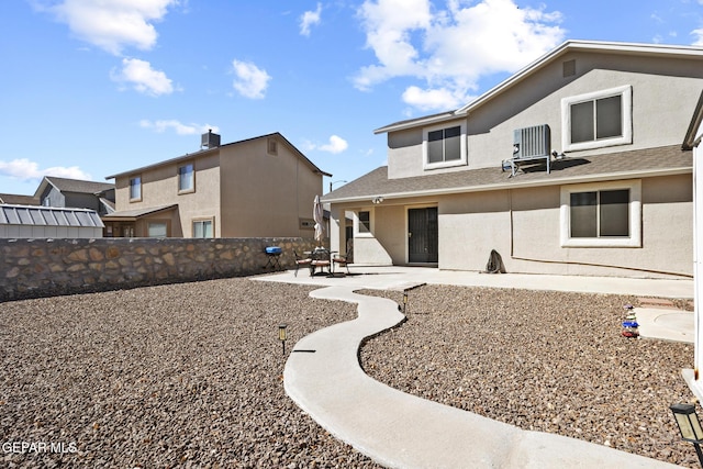 back of house featuring a patio and central AC