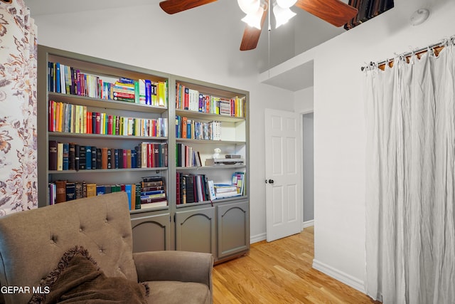 sitting room with light hardwood / wood-style flooring and ceiling fan