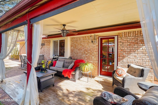 view of patio featuring an outdoor living space and ceiling fan